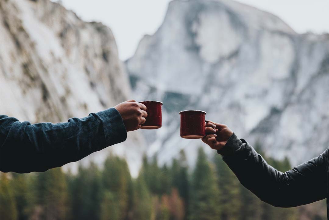 Two people drinking coffee in Yosemite